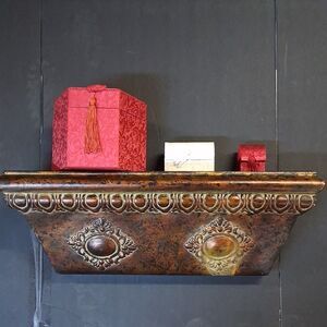 Metal  16" X 5" rectangular copper hanging shelf with embossed ornate designs